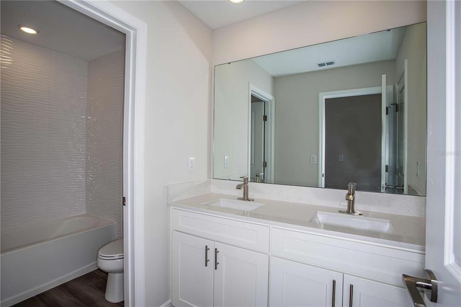 Furnished interior view inside a new home in Pasadena Woods, Wesley Chapel (Image 8). Furnished interior view inside a new home in Pasadena Woods, Wesley Chapel (Image 8).