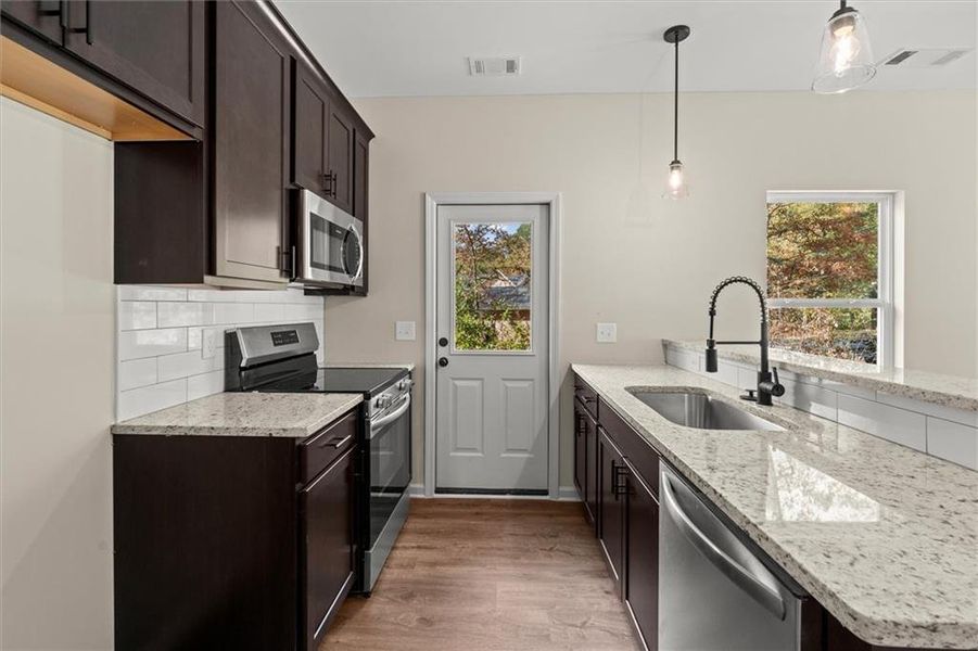 Furnished interior view inside a new home in , Carrollton (Image 7).