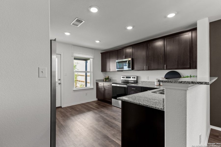 Furnished interior view inside a new home in Dove Song, Marion (Image 20).