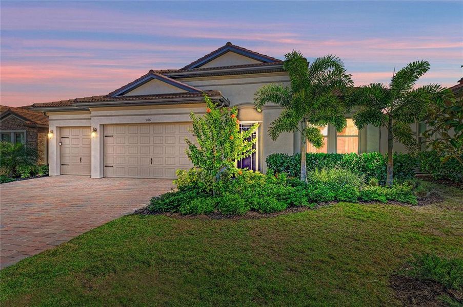 Front exterior of a new home in , Nokomis, FL, highlighting curb appeal (Image 27). Front exterior of a new home in , Nokomis, FL, highlighting curb appeal (Image 27).