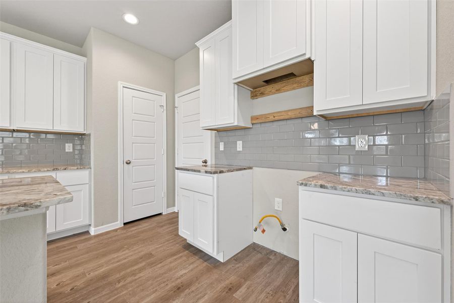 Furnished interior view inside a new home in Woodland Lakes, Huffman (Image 8).
