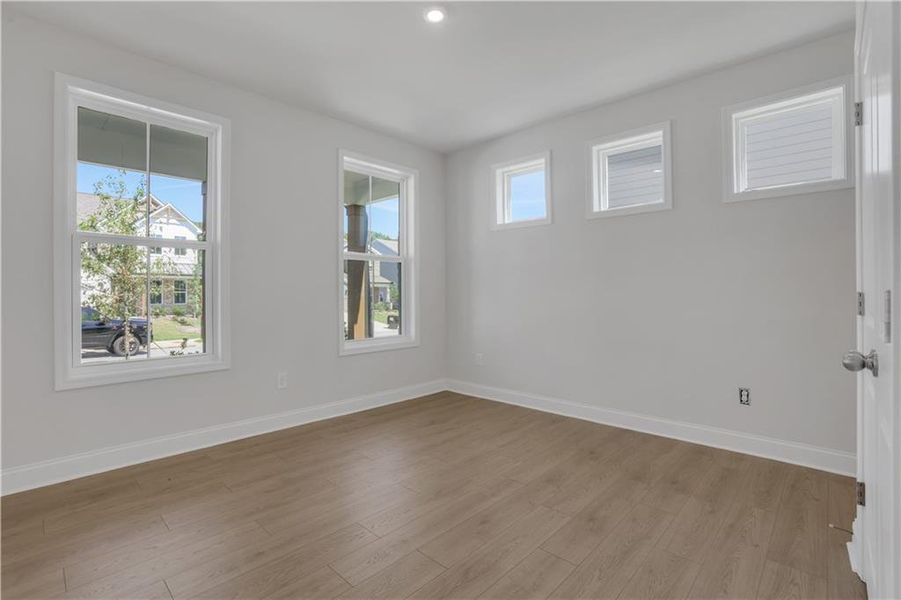 Spacious, unfurnished interior of a new home in The Paddocks at Doc Hughes, Buford (Image 37).