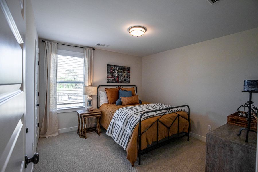Representative furnished interior of a home built from the Willow by Grant & Co in Manor at Hall Creek, Arlington (Image 91).