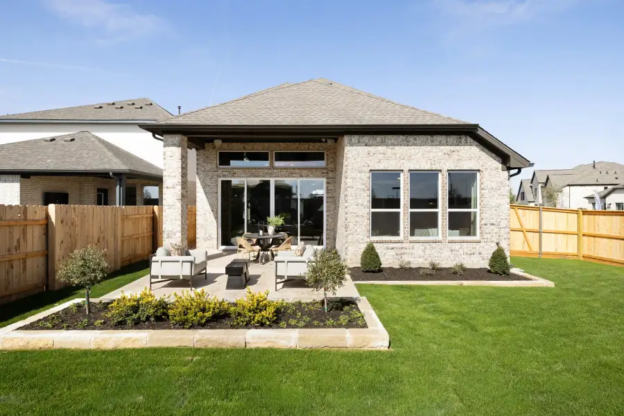 Exterior details and patio area of a home in Flora, Hutto (Image 26).