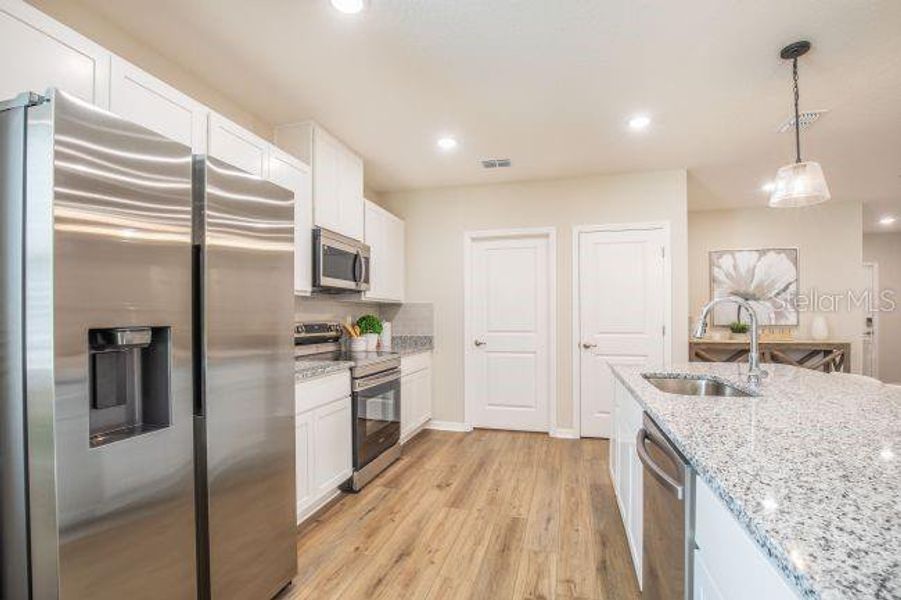 Furnished interior view inside a new home in Benton Hills, Brooksville (Image 19).