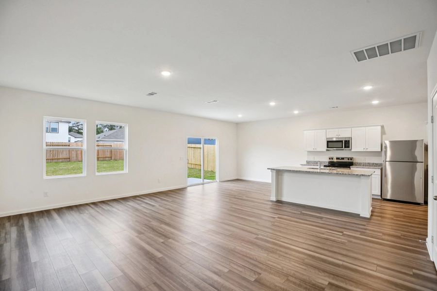Representative unfurnished interior of a home built from the Discovery by Starlight Homes in Sunset Oaks, Maxwell (Image 16).