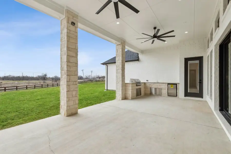 Exterior details and patio area of a home in The Vines, Haslet (Image 4).