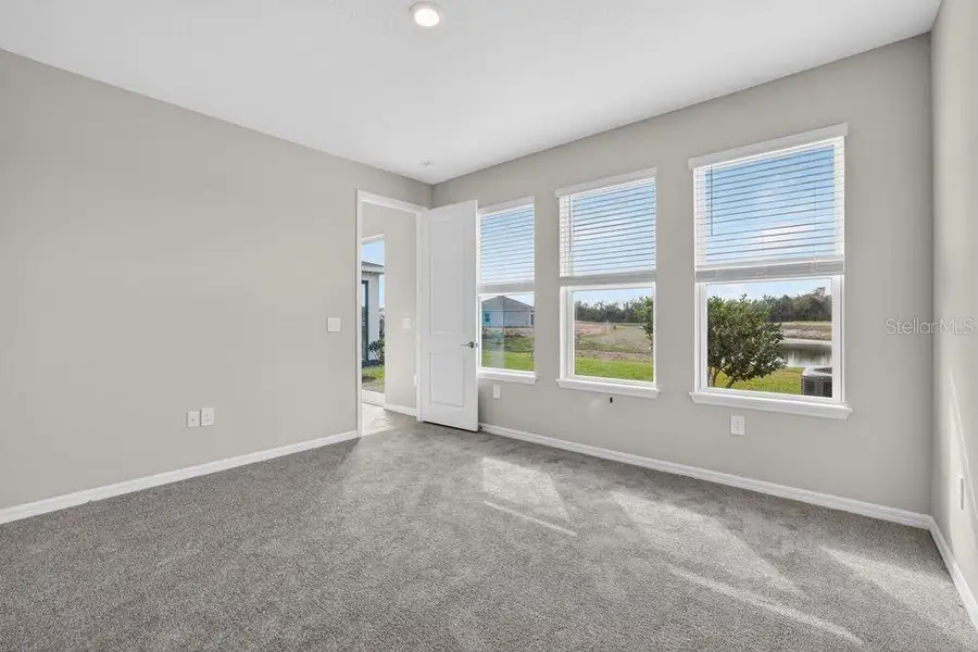 Spacious, unfurnished interior of a new home in Firethorn, Parrish (Image 30).