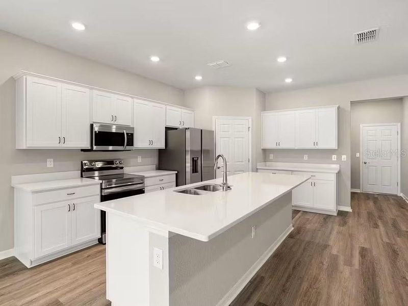 Furnished interior view inside a new home in Falls of Ocala, Ocala (Image 4).