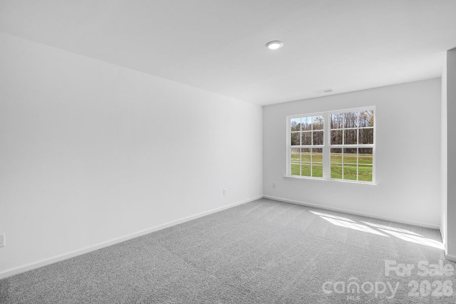 Spacious, unfurnished interior of a new home in Cannon Village, York (Image 12).