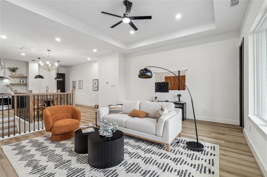 From the living room, natural light pours in and creates a harmonious flow into the dining area, with the second-floor primary bedroom just steps away—making this your perfect morning retreat