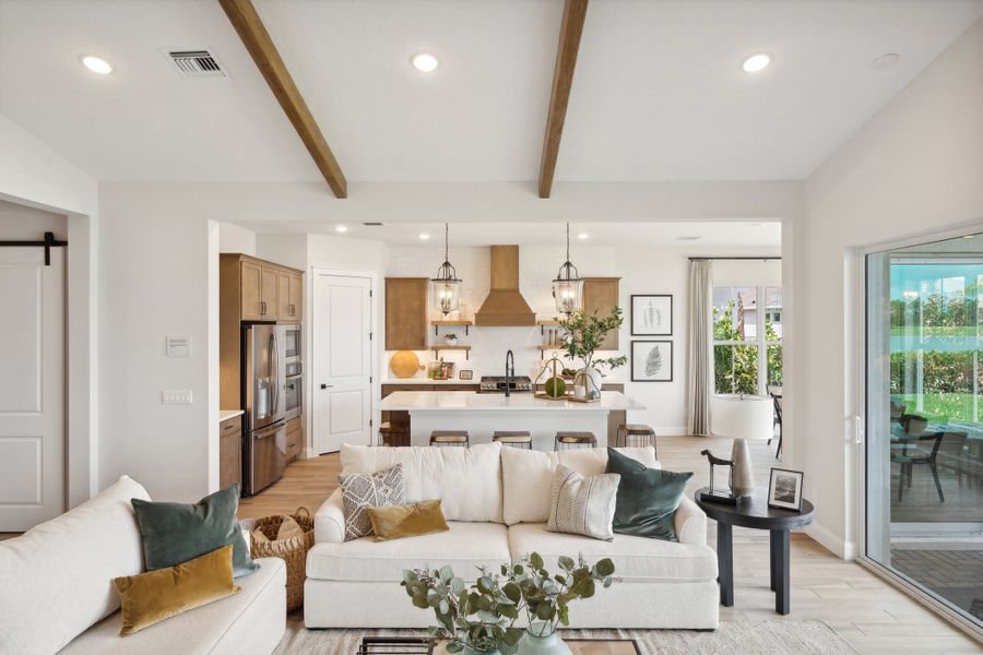 Great room with stained ceiling beams