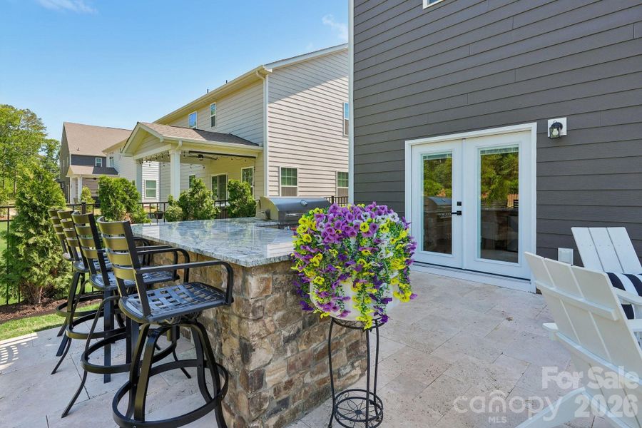 Exterior details and patio area of a home in , Indian Trail (Image 27).