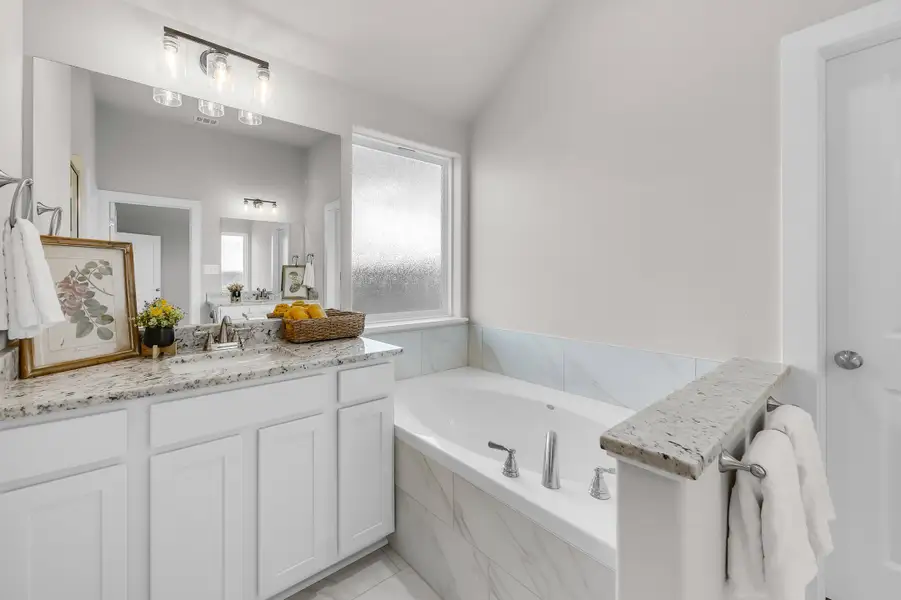 Representative furnished interior of a home built from the The Poppy by Avonley Homes in Rudder Pointe, Bryan (Image 5).