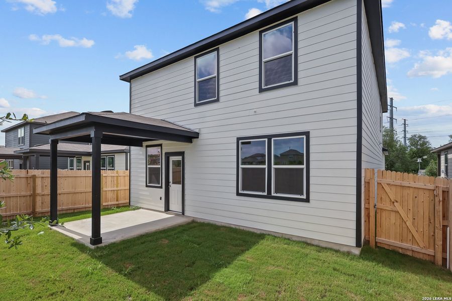 Exterior details and patio area of a home in Spring Creek, San Antonio (Image 3).