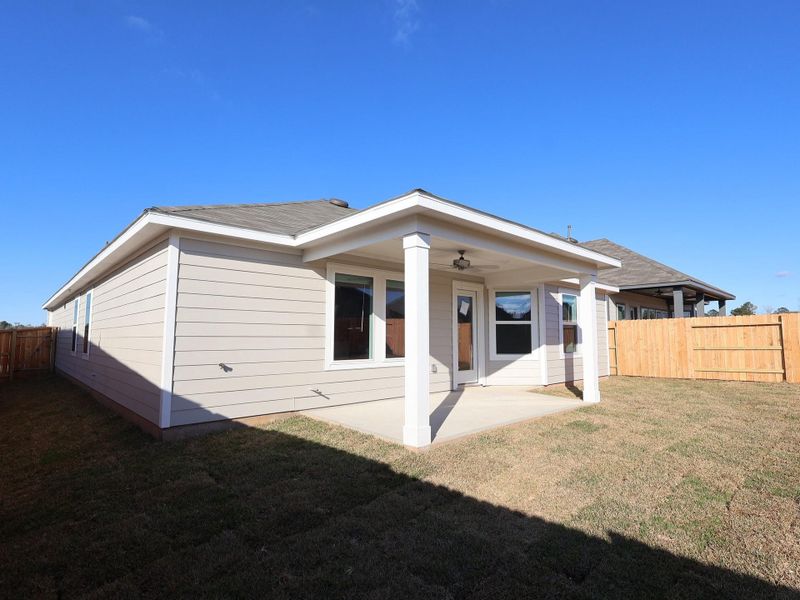 Exterior details and patio area of a home in Lone Star Landing, Montgomery (Image 20). Exterior details and patio area of a home in Lone Star Landing, Montgomery (Image 20).
