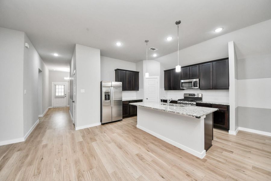 Furnished interior view inside a new home in Marvida, Cypress (Image 14).