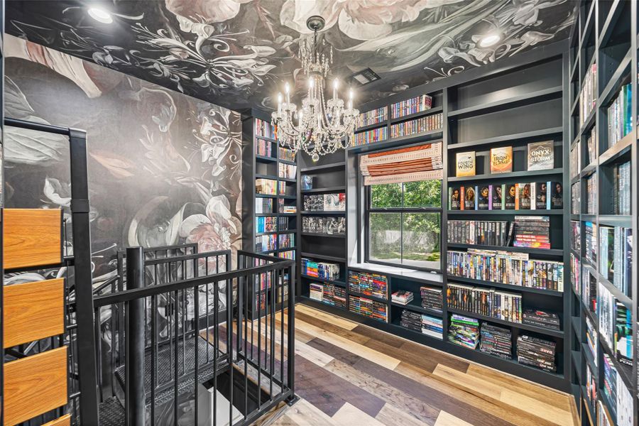 Sophisticated upstairs library featuring elegant built-ins, accessible both from the spiral staircase and from the second-floor hallway. Sophisticated upstairs library featuring elegant built-ins, accessible both from the spiral staircase and from the second-floor hallway.