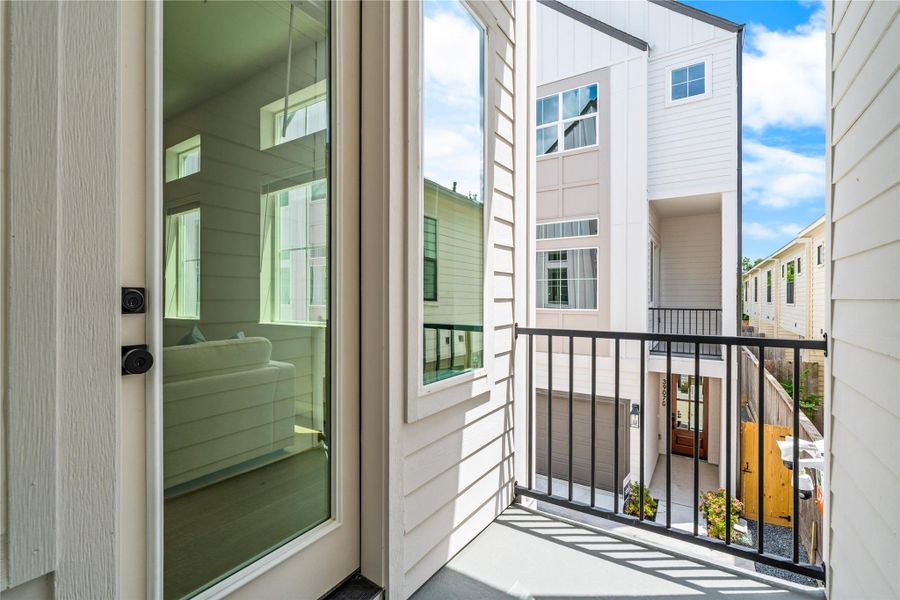 A private covered balcony adds another outdoor space to step outside and enjoy some fresh air without leaving home.