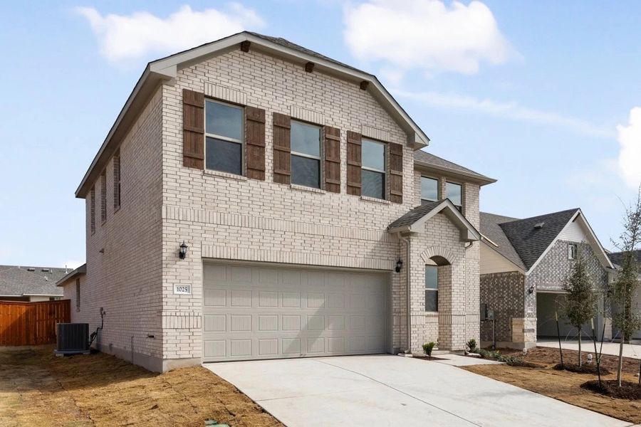 Front exterior of a new home in Berry Creek Highlands, Georgetown, TX, highlighting curb appeal (Image 27).