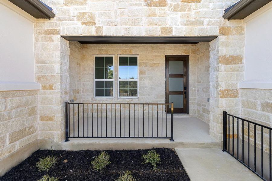 Exterior details and patio area of a home in Lariat, Liberty Hill (Image 23).