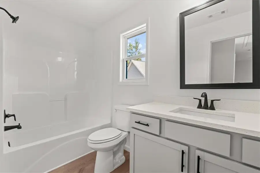 Furnished interior view inside a new home in , Carrollton (Image 5).