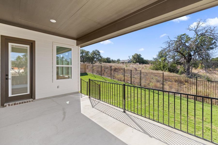 Exterior details and patio area of a home in Lariat, Liberty Hill (Image 3).