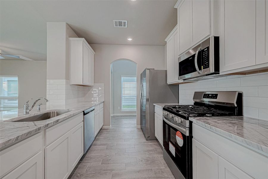 Furnished interior view inside a new home in Woodland Lakes, Houston (Image 13). Furnished interior view inside a new home in Woodland Lakes, Houston (Image 13).