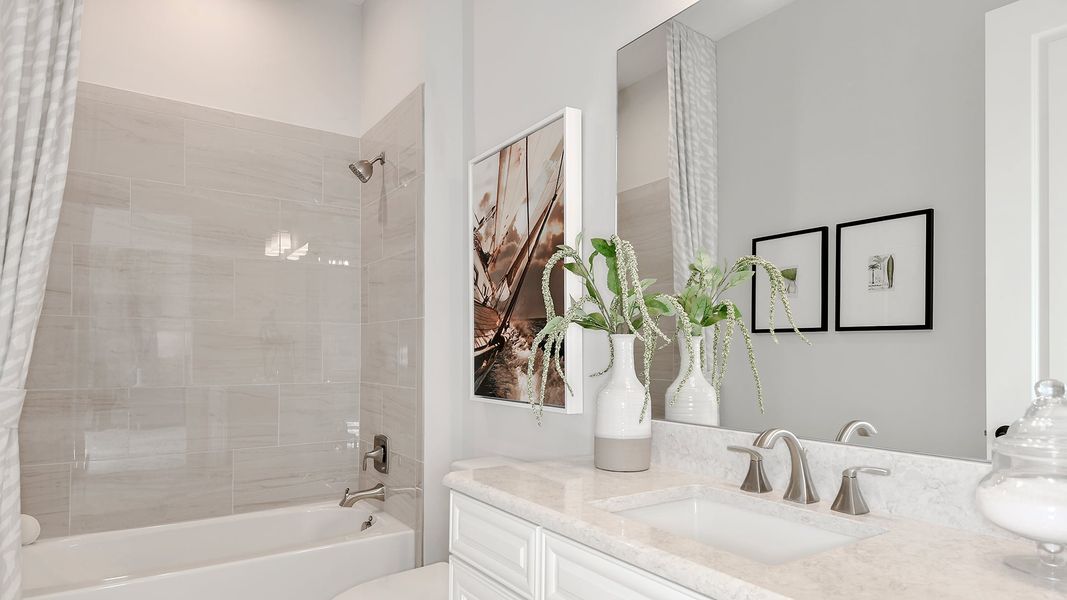 Furnished interior view inside a new home in Esplanade at Tradition, Port St. Lucie (Image 16).