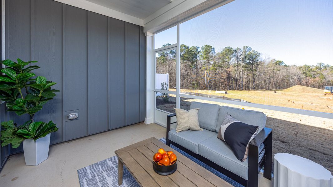 Exterior details and patio area of a home in The Courtyards at Oak Grove, Durham (Image 3).