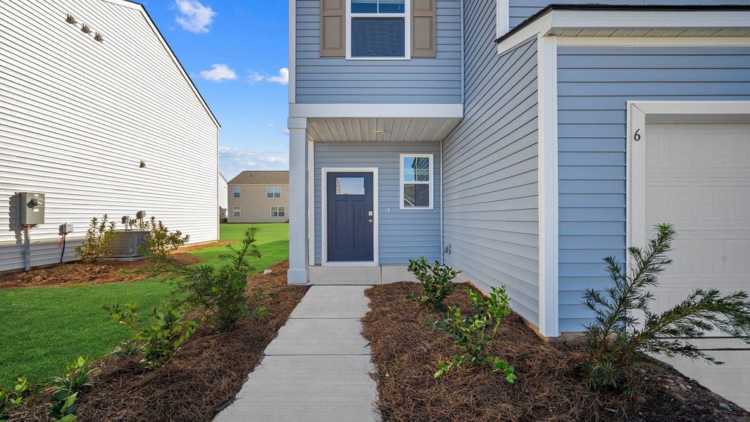 Exterior details and patio area of a home in The Retreat at East Argent, Ridgeland (Image 3).