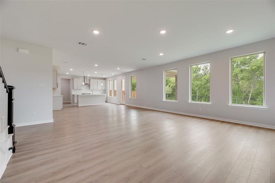 Spacious, unfurnished interior of a new home in Valencia On The Lake, Little Elm (Image 29). Spacious, unfurnished interior of a new home in Valencia On The Lake, Little Elm (Image 29).