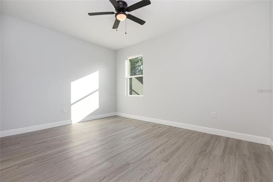 Spacious, unfurnished interior of a new home in , Port Charlotte (Image 17).