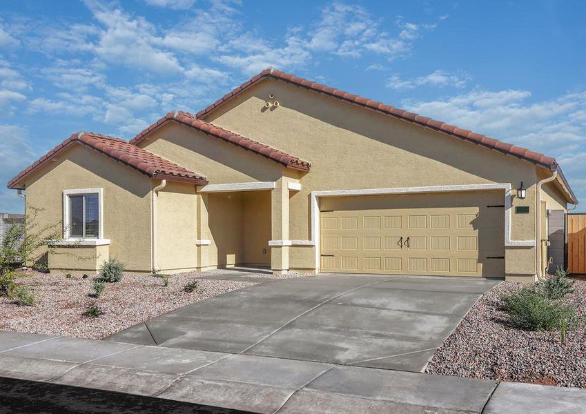 Check out this 2-car garage and professional landscaping!