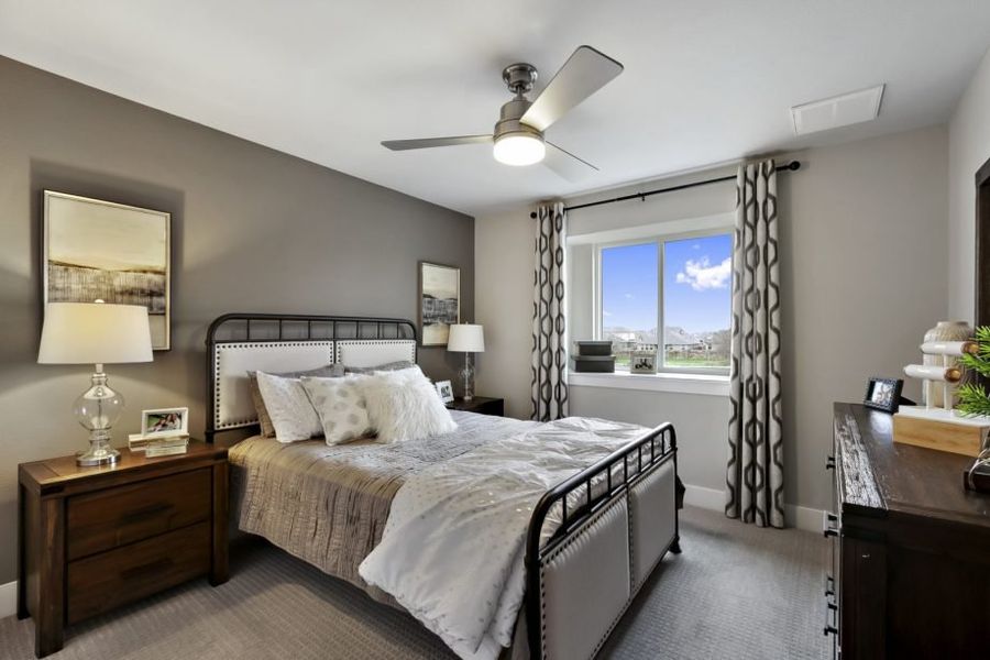 Representative furnished interior of a home built from the Houston by Pacesetter Homes in Village At Manor Commons, Manor (Image 16).