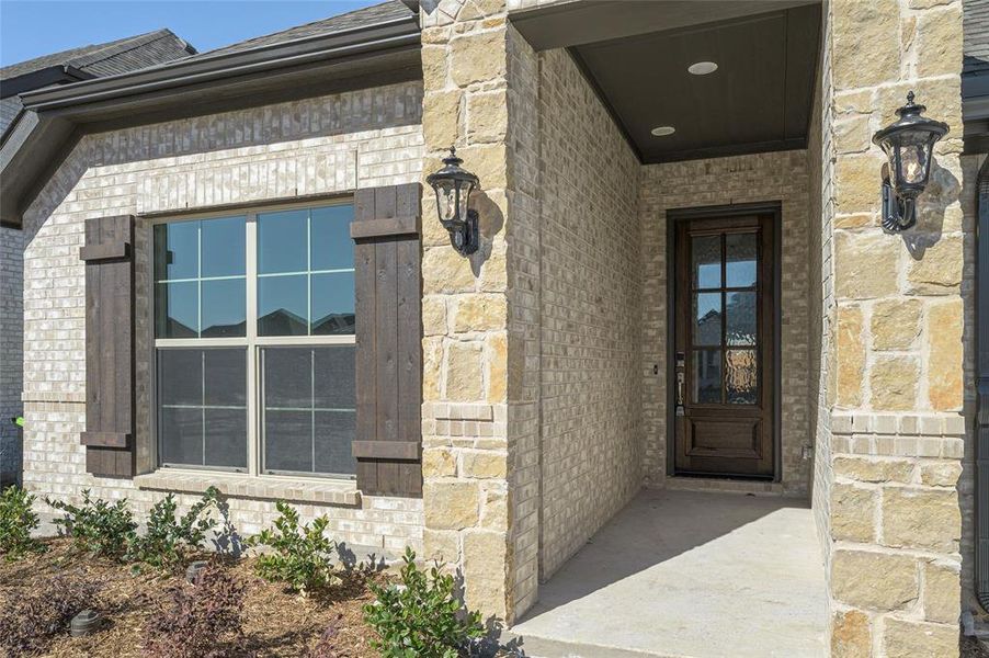 Exterior details and patio area of a home in Creekview Meadows, Pilot Point (Image 22).