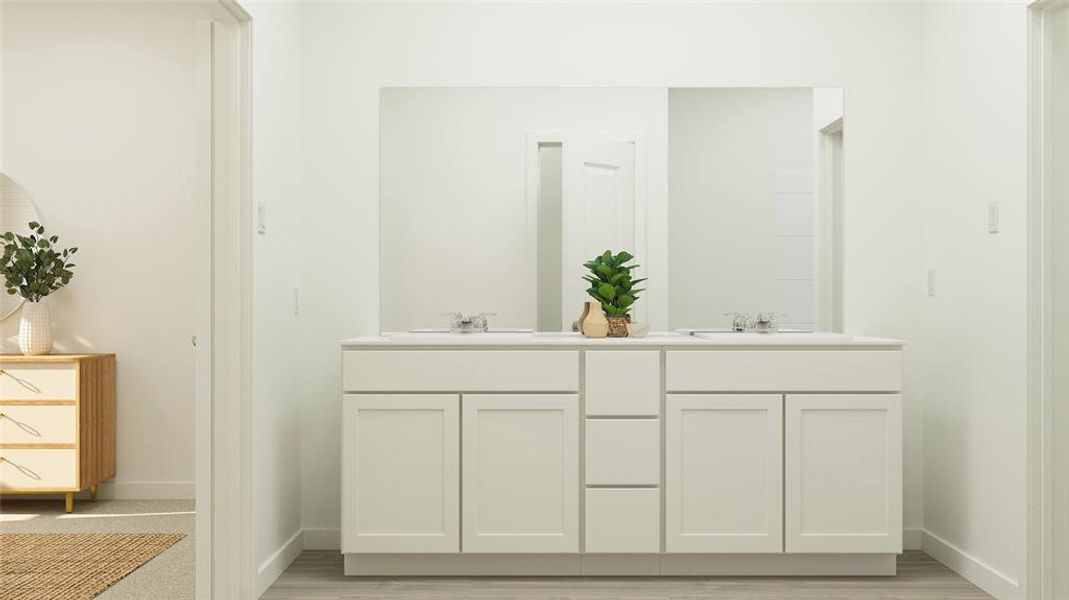 Bathroom with hardwood / wood-style flooring and vanity