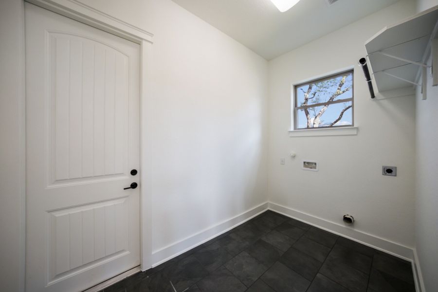 Representative unfurnished interior of a home built from the The Travis by Whitestone Custom Homes in Johnson Ranch, Bulverde (Image 45).