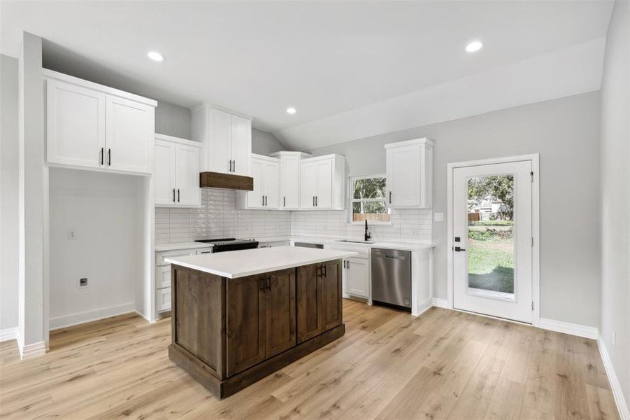 Unfurnished room with ceiling fan and light hardwood / wood-style floors