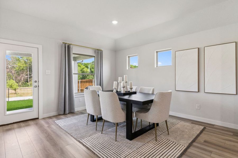 Dining Room in the Emmy II home plan by Trophy Signature Homes