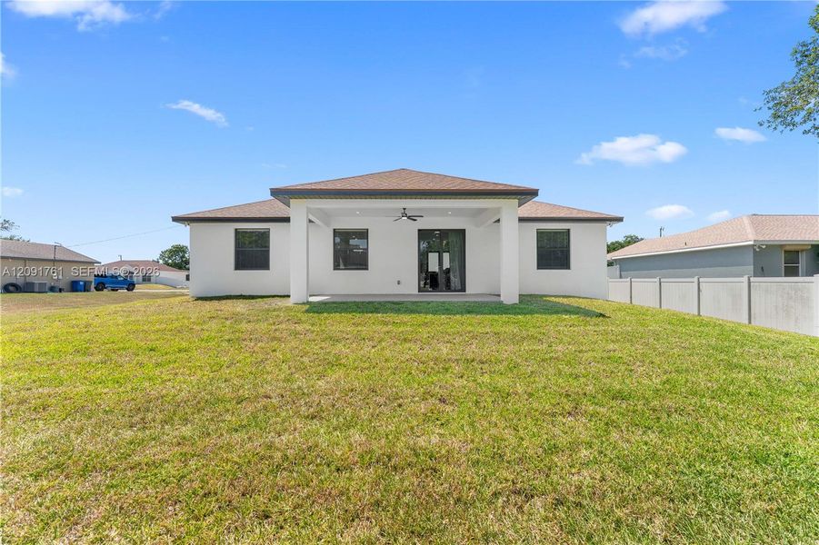 Exterior details and patio area of a home in , Lehigh Acres (Image 22). Exterior details and patio area of a home in , Lehigh Acres (Image 22).