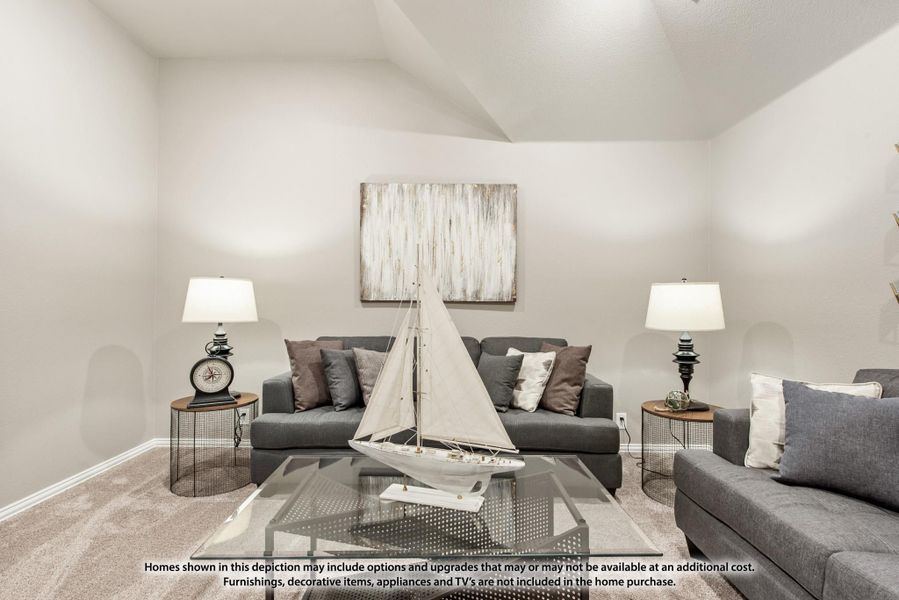 Living room with gray sofas, glass coffee table, and sailboat decor on carpet flooring Living room with gray sofas, glass coffee table, and sailboat decor on carpet flooring