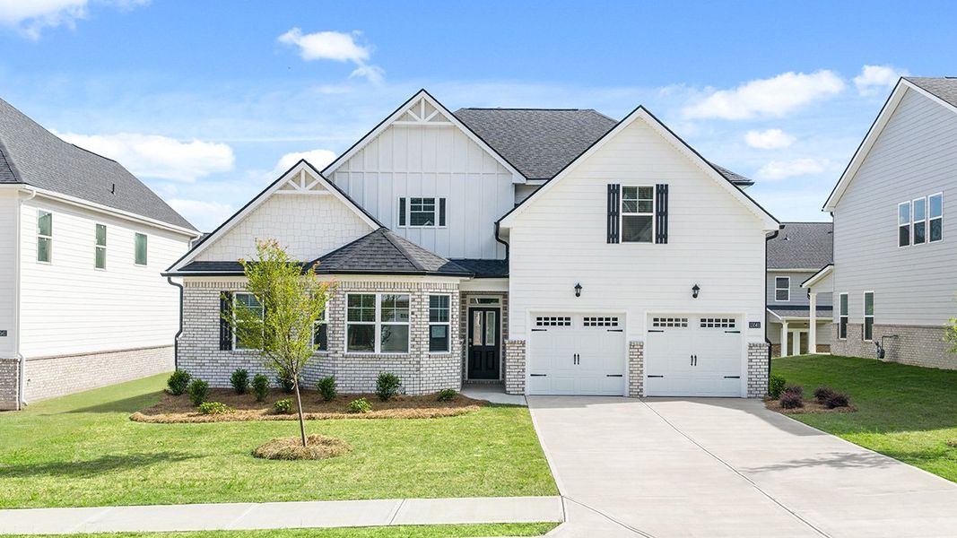 Front exterior of a new home in Wildwood, Covington, GA, highlighting curb appeal (Image 2). Front exterior of a new home in Wildwood, Covington, GA, highlighting curb appeal (Image 2).