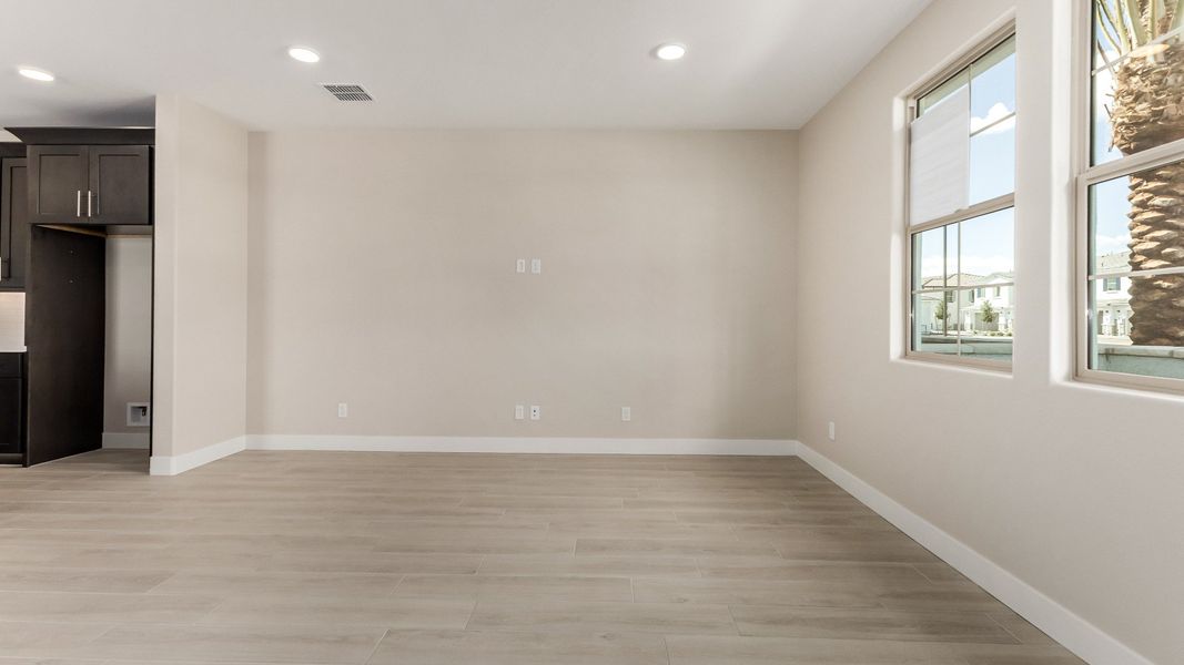 Representative furnished interior of a home built from the The Delaney by DRB Homes in Surprise City Center, Surprise (Image 9).