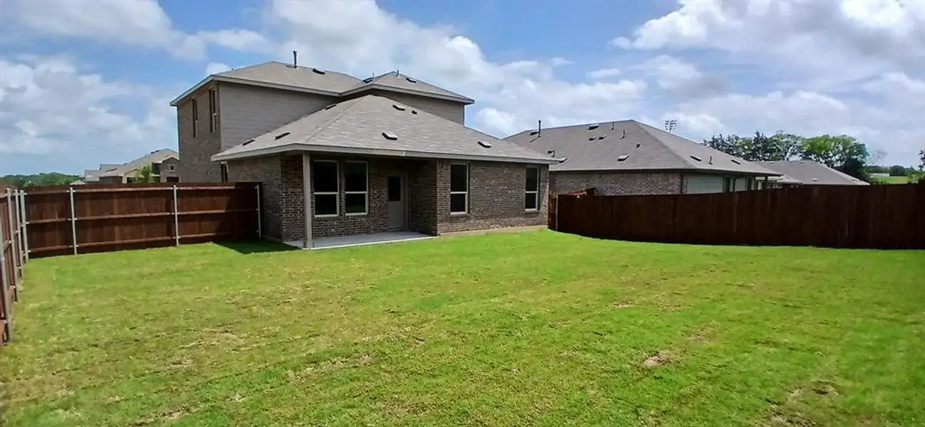 Exterior details and patio area of a home in The Canyons, Keene (Image 3).