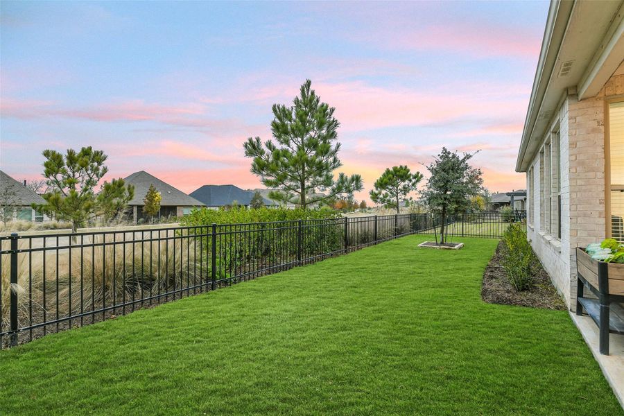 Exterior details and patio area of a home in Del Webb in Chambers Creek, Willis (Image 23). Exterior details and patio area of a home in Del Webb in Chambers Creek, Willis (Image 23).