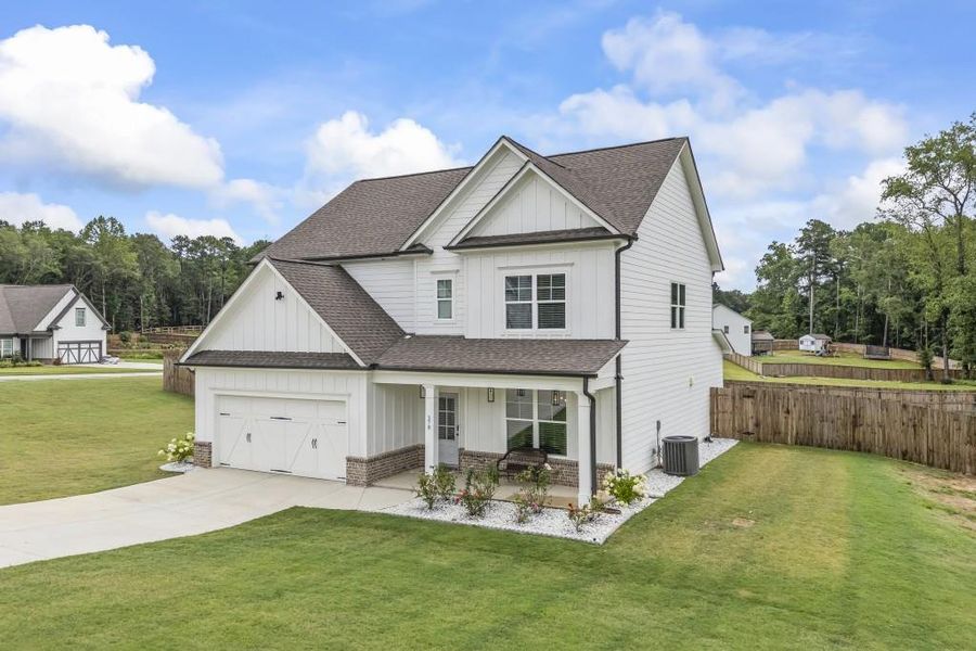 Front exterior of a new home in , Winder, GA, highlighting curb appeal (Image 24).