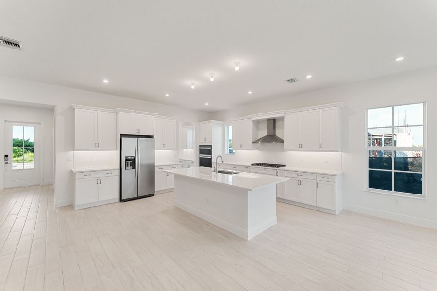 Representative unfurnished interior of a home built from the Zinnia by Mattamy Homes in Newfield - Rosette Park, Palm City (Image 9).