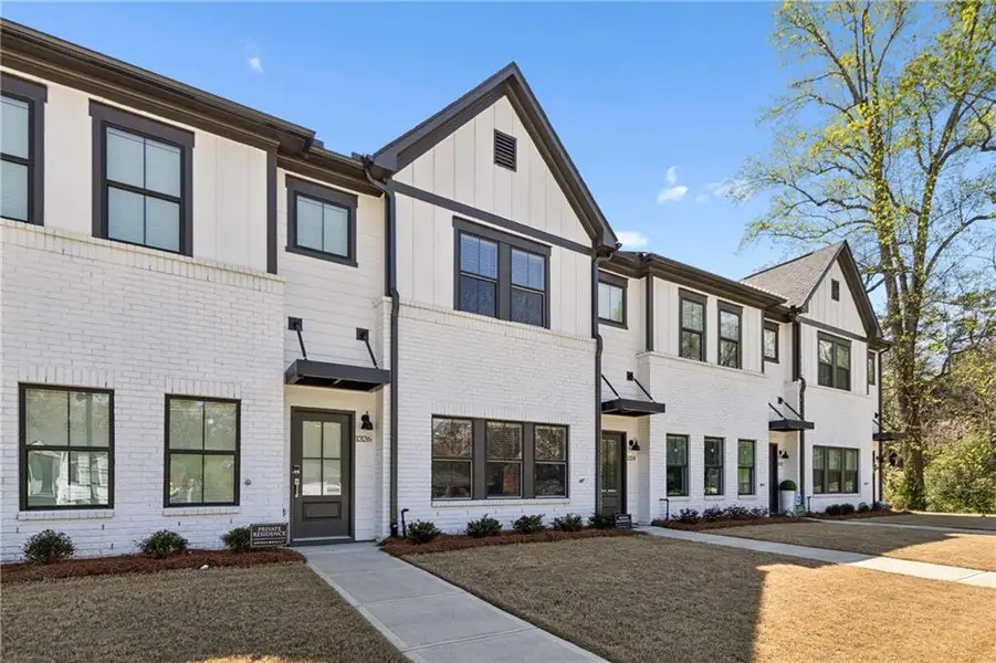 Front exterior of a new home in , Atlanta, GA, highlighting curb appeal (Image 21).