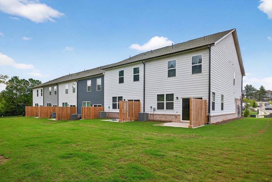 Front exterior of a new home in Fernhurst, McDonough, GA, highlighting curb appeal (Image 22).